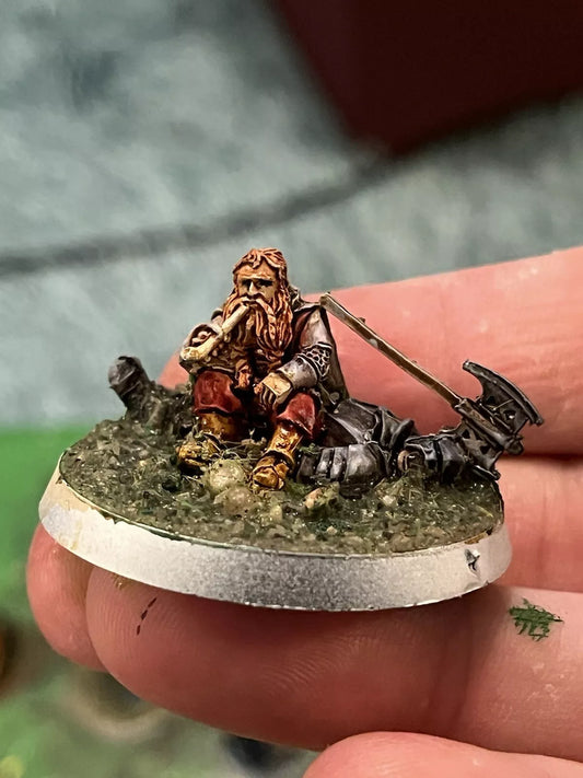 Gimli on Dead Uruk Hai: Lord of the Rings